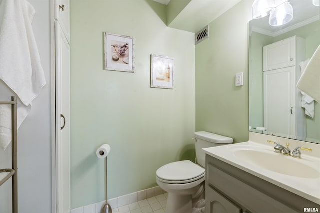 1800 7th St Unit 7A, East Moline, IL 61244 - bathroom featuring vanity, crown molding, and tile patterned floors