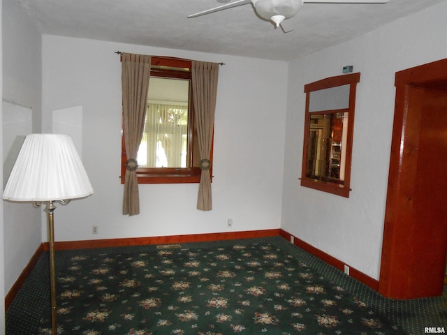 636 3rd St, Buffalo, IA 52728 - unfurnished room featuring ceiling fan and carpet flooring