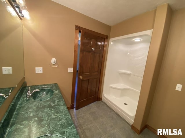 1501 Erinberry St, Marion, IL 62959 - full bathroom featuring double vanity and tile patterned floors