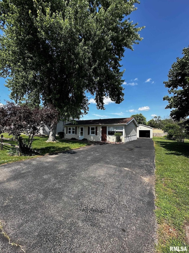 920 5th St, Colona, IL 61241 - ranch-style house featuring a garage, a front lawn, and driveway
