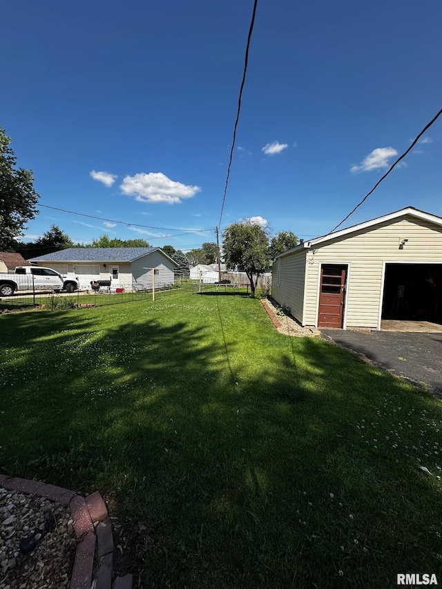 920 5th St, Colona, IL 61241 - view of yard featuring a garage and an outdoor structure