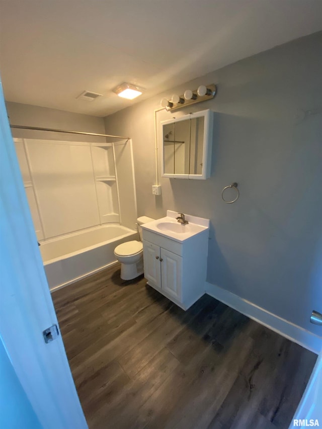 201 N 20th St, East Moline, IL 61244 - bathroom featuring vanity, shower / tub combination, and wood finished floors