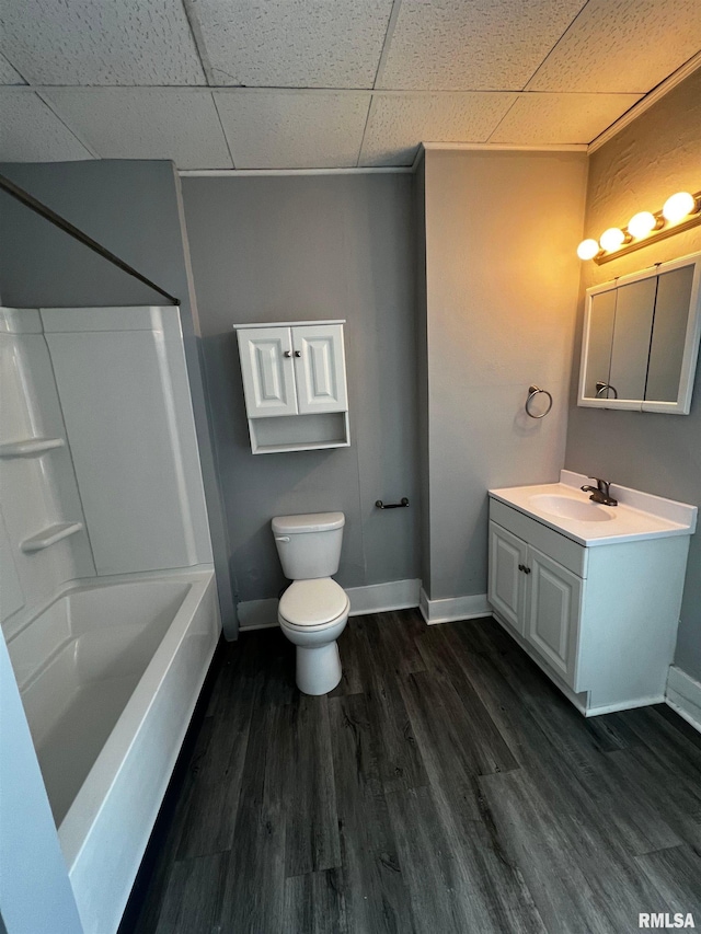 201 N 20th St, East Moline, IL 61244 - full bath featuring vanity, wood finished floors, bathtub / shower combination, and a paneled ceiling