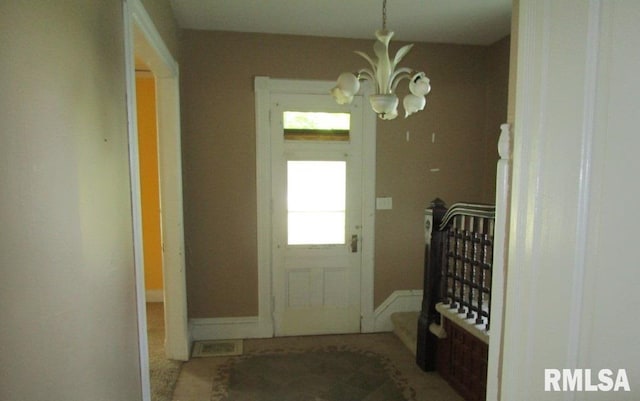 504 N College Ave, Aledo, IL 61231 - doorway with a chandelier