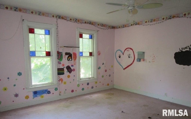 504 N College Ave, Aledo, IL 61231 - unfurnished room featuring light carpet and ceiling fan