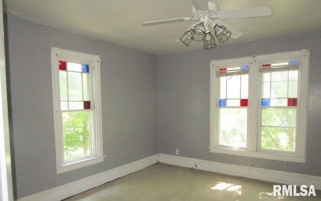 504 N College Ave, Aledo, IL 61231 - carpeted spare room featuring a ceiling fan and baseboards
