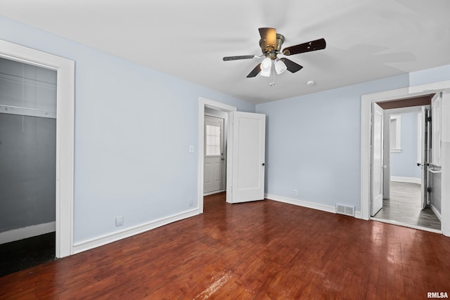 2428 18th Ave, Rock Island, IL 61201 - unfurnished bedroom with wood finished floors and ceiling fan