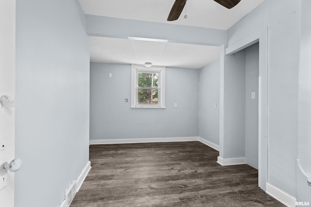 2428 18th Ave, Rock Island, IL 61201 - empty room with a ceiling fan and dark wood-type flooring