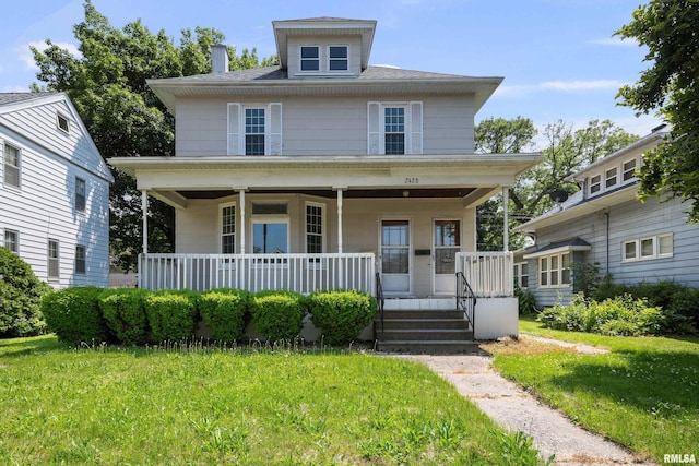 2428 18th Ave, Rock Island, IL 61201 - traditional style home with a porch and a front lawn