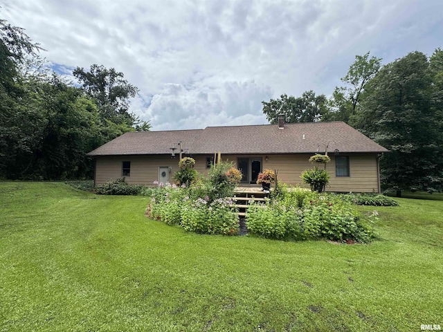 5560 Hidden Acres Ln, Carterville, IL 62918 - rear view of house with a yard and a chimney