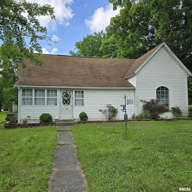 314 Chestnut St, Cambria, IL 62915 - view of front of house with a front yard and a shingled roof