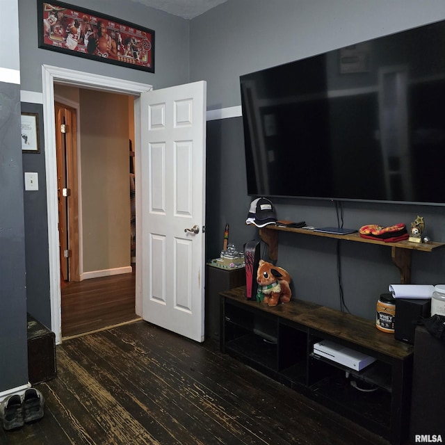 314 Chestnut St, Cambria, IL 62915 - interior space featuring dark wood-type flooring and baseboards
