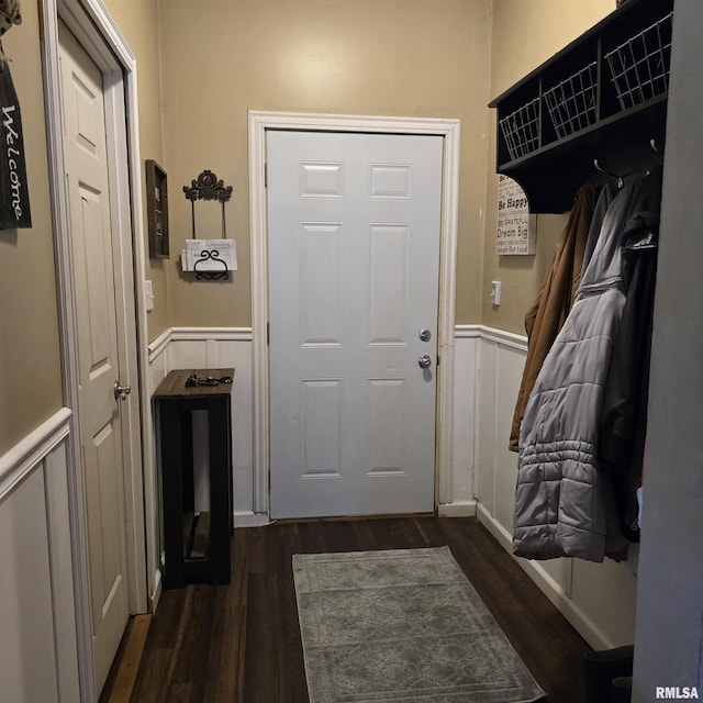314 Chestnut St, Cambria, IL 62915 - mudroom with a wainscoted wall, dark wood-style floors, and a decorative wall