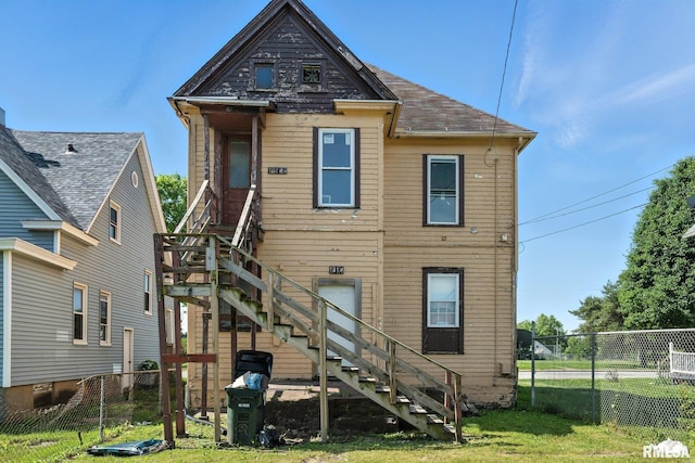 1614 W 3rd St, Davenport, IA 52802 - rear view of property featuring stairway