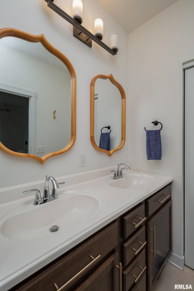 3458 Glenbrook Cir N, Bettendorf, IA 52722 - bathroom featuring double vanity