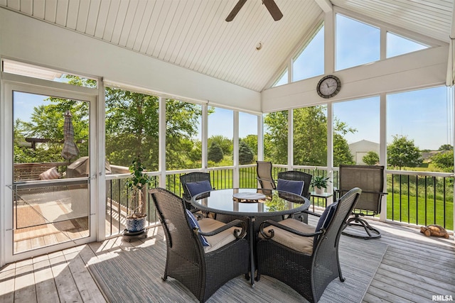 3563 Cobblestone Dr, Bettendorf, IA 52722 - sunroom with a ceiling fan, vaulted ceiling, and outdoor dining space