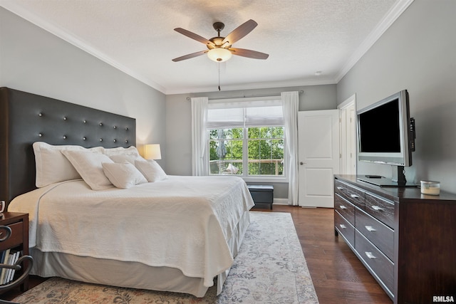 3563 Cobblestone Dr, Bettendorf, IA 52722 - bedroom with dark wood-style floors, ornamental molding, a textured ceiling, and a ceiling fan