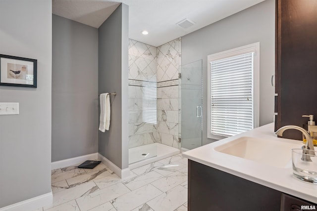 3563 Cobblestone Dr, Bettendorf, IA 52722 - full bathroom with marble finish flooring, a shower stall, vanity, and recessed lighting
