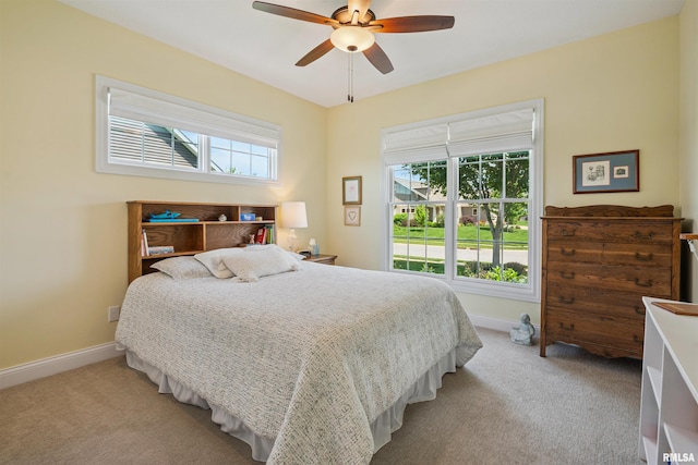 3563 Cobblestone Dr, Bettendorf, IA 52722 - bedroom with light carpet and ceiling fan