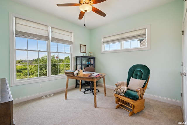3563 Cobblestone Dr, Bettendorf, IA 52722 - home office with a ceiling fan and carpet
