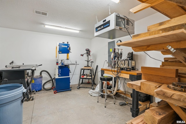 3563 Cobblestone Dr, Bettendorf, IA 52722 - garage with a heating unit and electric panel