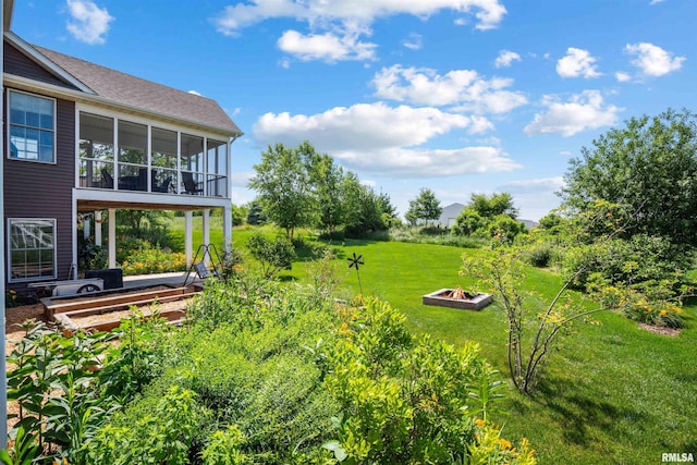 3563 Cobblestone Dr, Bettendorf, IA 52722 - view of green lawn with a sunroom