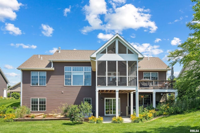 3563 Cobblestone Dr, Bettendorf, IA 52722 - rear view of house featuring a yard, a sunroom, a wooden deck, and roof with shingles