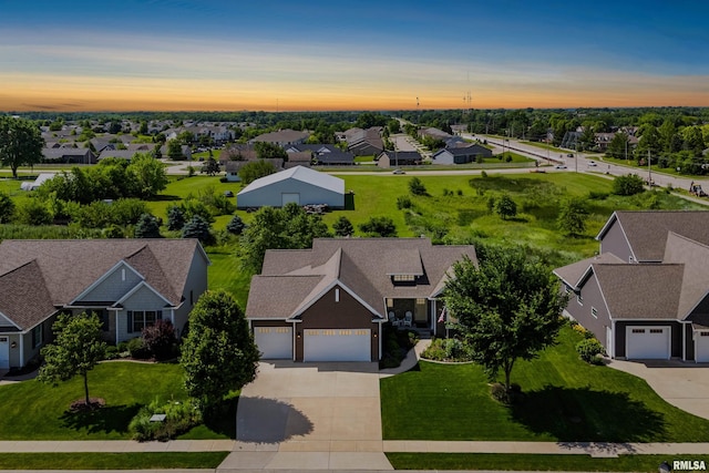3563 Cobblestone Dr, Bettendorf, IA 52722 - aerial view at dusk of a residential view