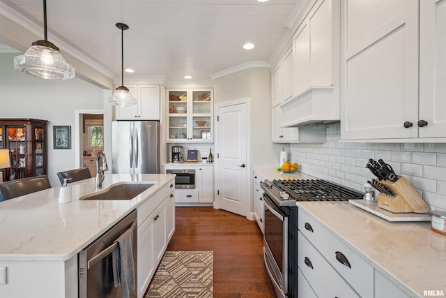 3563 Cobblestone Dr, Bettendorf, IA 52722 - kitchen featuring stainless steel appliances, recessed lighting, white cabinetry, glass insert cabinets, and dark wood-style flooring