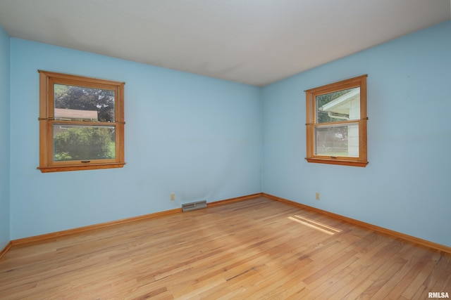 3403 Kimberly Downs Rd, Davenport, IA 52807 - empty room featuring light wood-type flooring and baseboards