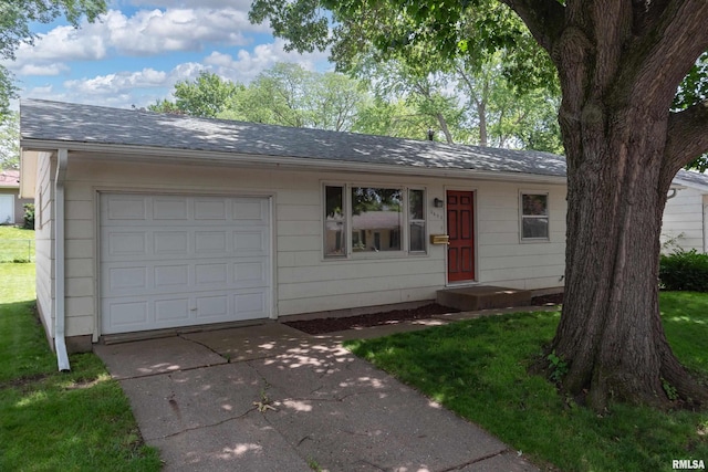 3403 Kimberly Downs Rd, Davenport, IA 52807 - ranch-style house with driveway, roof with shingles, and an attached garage
