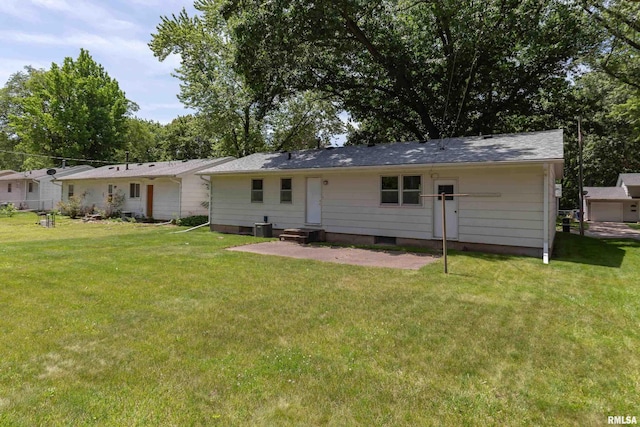 3403 Kimberly Downs Rd, Davenport, IA 52807 - rear view of property with a yard and a patio area