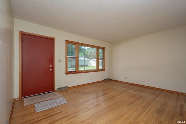 3403 Kimberly Downs Rd, Davenport, IA 52807 - entryway featuring light wood-style flooring and baseboards