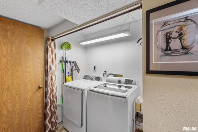 493 44th Avenue Ct, East Moline, IL 61244 - laundry room with independent washer and dryer and a textured ceiling