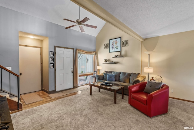 493 44th Avenue Ct, East Moline, IL 61244 - carpeted living area featuring lofted ceiling, a ceiling fan, stairs, and a textured ceiling