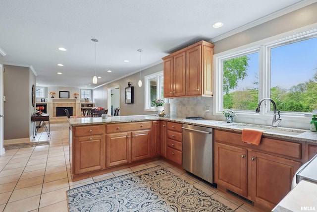 4444 Spring St, Davenport, IA 52807 - kitchen featuring stainless steel dishwasher, light tile patterned flooring, crown molding, recessed lighting, and a peninsula