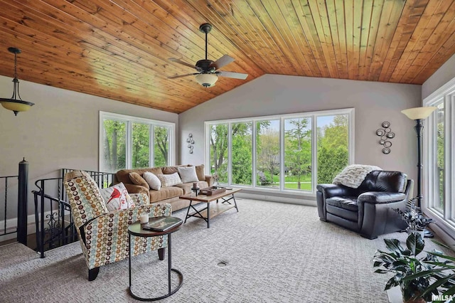 4444 Spring St, Davenport, IA 52807 - carpeted living room featuring vaulted ceiling, a ceiling fan, plenty of natural light, and wood ceiling