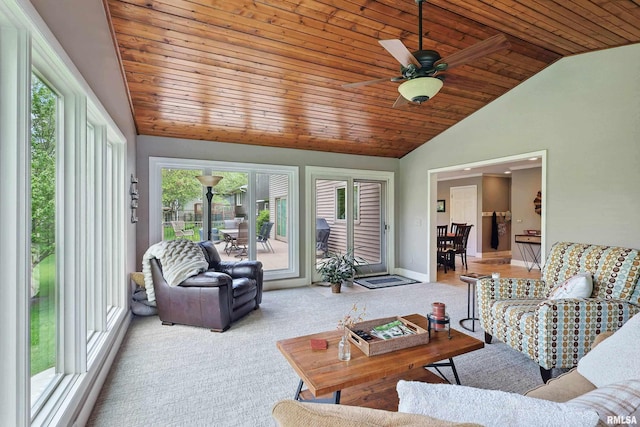 4444 Spring St, Davenport, IA 52807 - carpeted living room featuring vaulted ceiling, plenty of natural light, wooden ceiling, and a ceiling fan