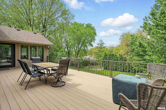 4444 Spring St, Davenport, IA 52807 - wooden deck with outdoor dining space