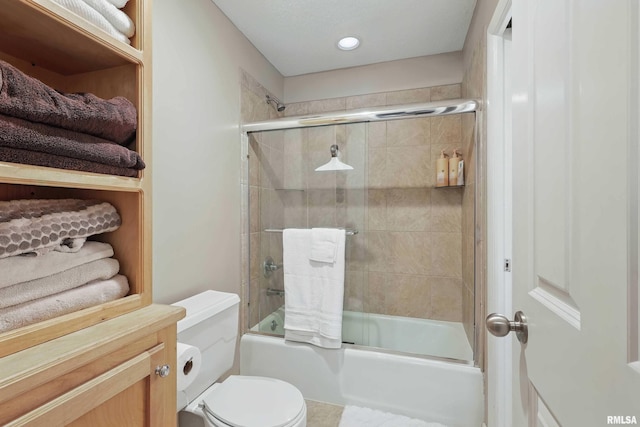 4444 Spring St, Davenport, IA 52807 - bathroom with toilet and shower / bath combination with glass door