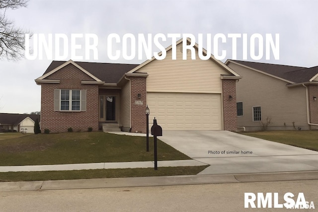 3521 72nd St, Moline, IL 61265 - view of front of home with brick siding, driveway, a garage, and a front yard