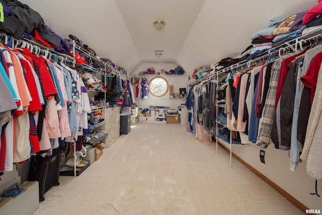 4934 Foxborough Ct, Bettendorf, IA 52722 - spacious closet featuring vaulted ceiling and carpet