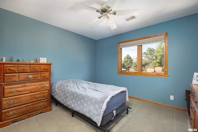 4934 Foxborough Ct, Bettendorf, IA 52722 - bedroom with light colored carpet and a ceiling fan