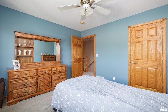 4934 Foxborough Ct, Bettendorf, IA 52722 - bedroom featuring carpet flooring and a ceiling fan