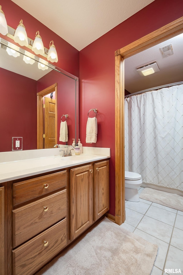 4934 Foxborough Ct, Bettendorf, IA 52722 - full bath featuring vanity, tile patterned flooring, and a shower with shower curtain