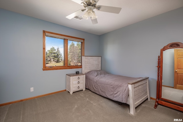 4934 Foxborough Ct, Bettendorf, IA 52722 - carpeted bedroom featuring baseboards and ceiling fan