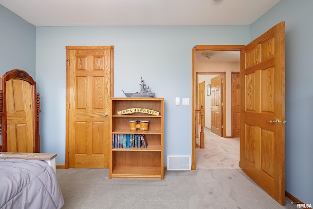 4934 Foxborough Ct, Bettendorf, IA 52722 - carpeted bedroom with baseboards