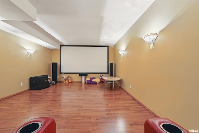 4934 Foxborough Ct, Bettendorf, IA 52722 - home theater with light wood finished floors and baseboards