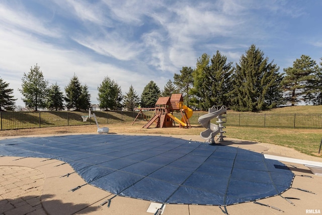 4934 Foxborough Ct, Bettendorf, IA 52722 - view of swimming pool featuring a playground, a water slide, and a diving board