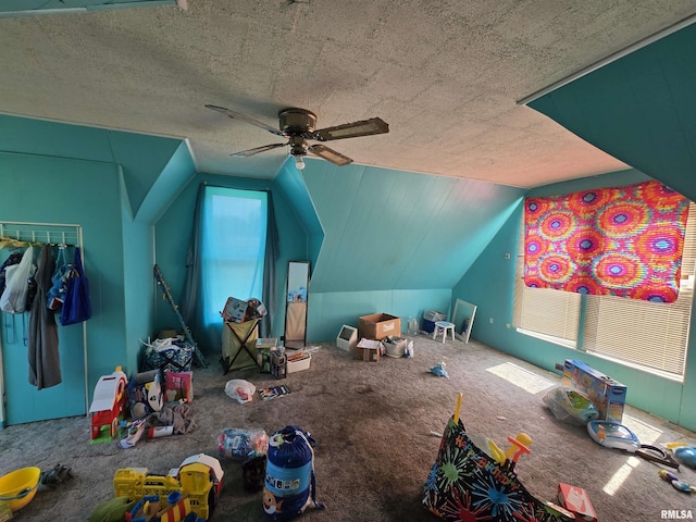 1429 Monroe St, Quincy, IL 62301 - playroom with carpet flooring, lofted ceiling, and ceiling fan